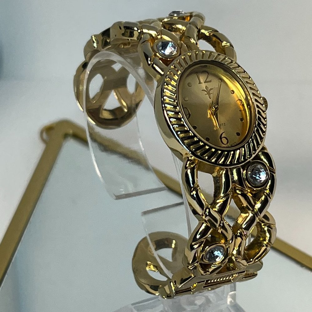 cute rhinestone gold tone make a statement cuff watch!! new battery runs great!
